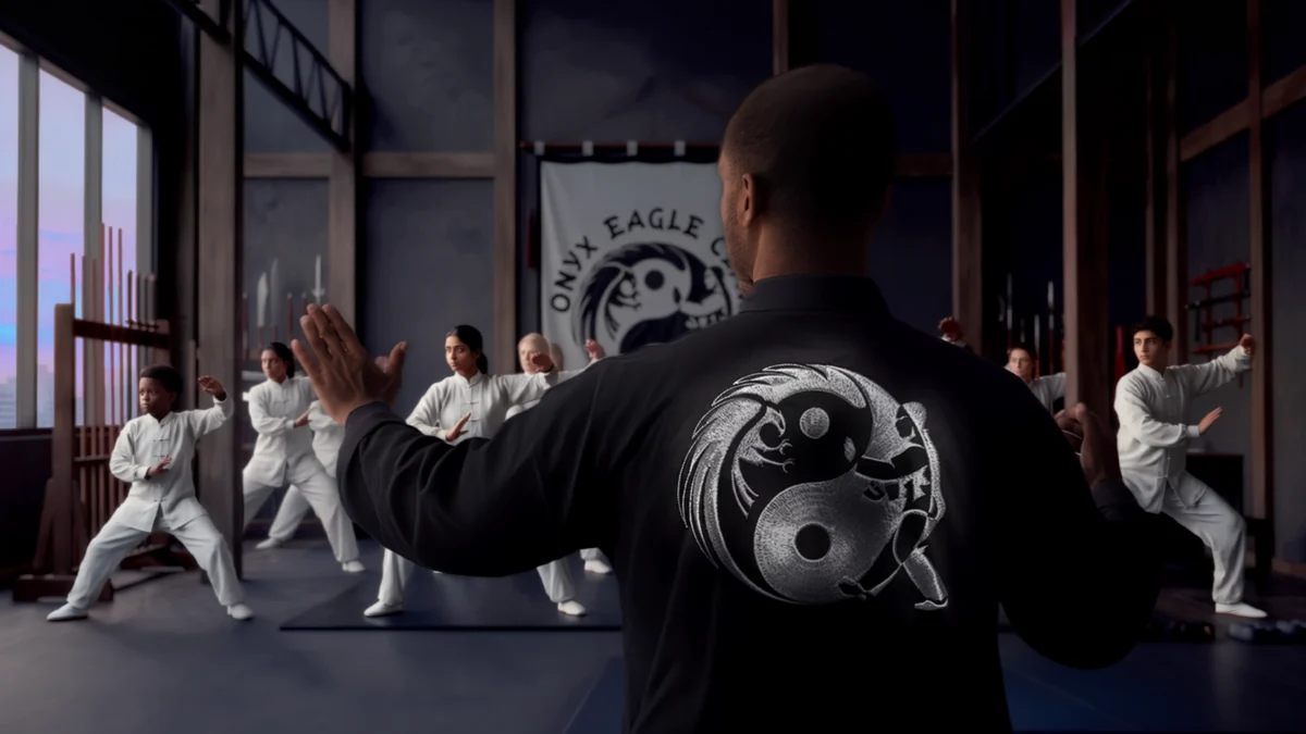 Concept mockup of the Onyx Eagle Claw identity on a black martial arts training jacket.